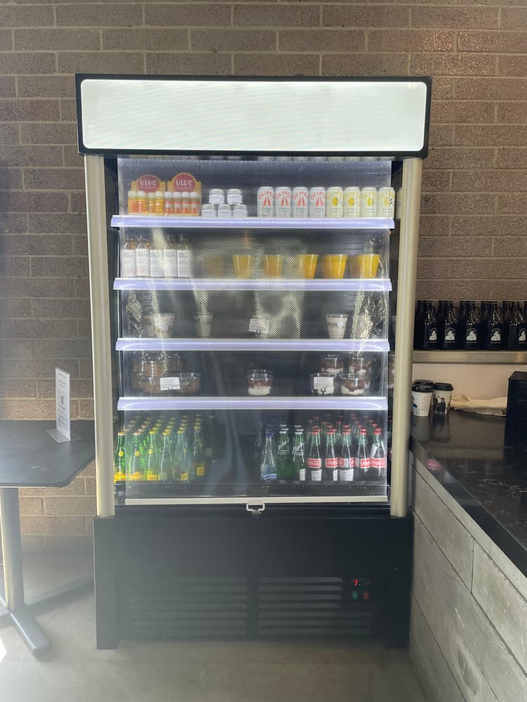 This fridge is used everyday at our coffee shop. For saying that it is a pretty good fridge. My only complaint is that if its a warm day out and you don’t have the plastic screen down the items inside will begain to get warm. If its a very hot day and the plastic screen in down it still has a hard time staying cold. In saying this I will say that we keep are shop pretty open and fresh air is always coming through so that could be the problem. For how much this is, it does a pretty good job.