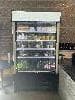This fridge is used everyday at our coffee shop. For saying that it is a pretty good fridge. My only complaint is that if its a warm day out and you don’t have the plastic screen down the items inside will begain to get warm. If its a very hot day and the plastic screen in down it still has a hard time staying cold. In saying this I will say that we keep are shop pretty open and fresh air is always coming through so that could be the problem. For how much this is, it does a pretty good job.
